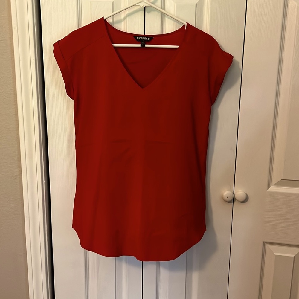Red Express Blouse. Size Small. Feels silky